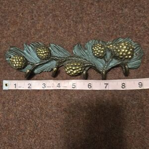 SPI Vintage Brass Wall Hook Rack Features a Pine Cone and Needle Design